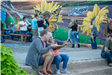 Couple takes selfie by Butterfly Mural at Rock the Route 2022