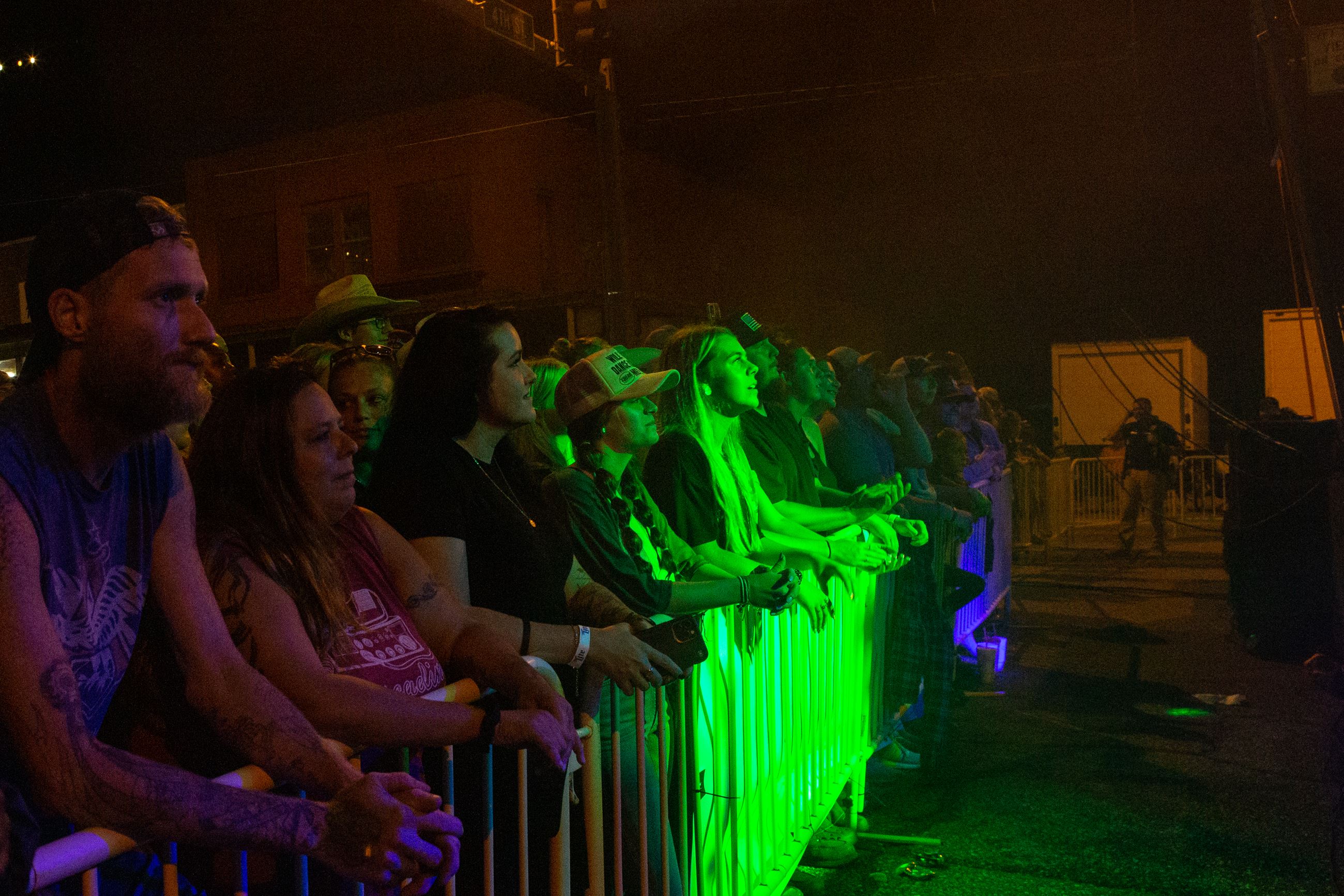 Rock the Route audience enjoys performance as green light shines on them