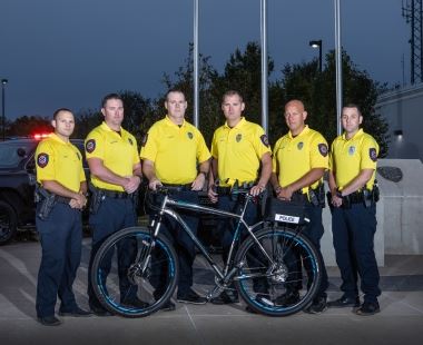 Group of People Next to a Bike