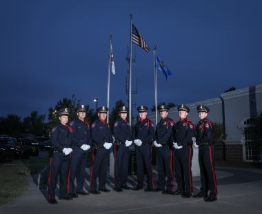 Group of People Next to Flags