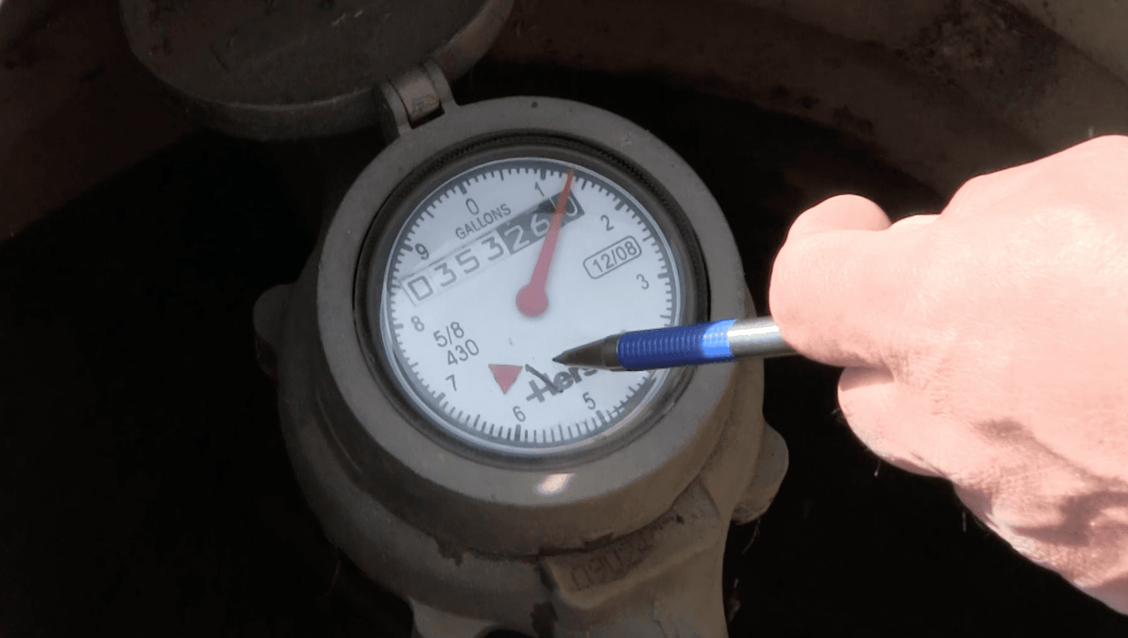 Checking the Water Meter to See if the Flow Indicator Has Moved